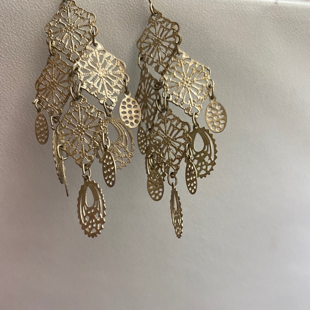 Silver tone filigree statement earrings